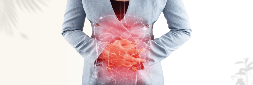 Woman holding her stomach, receiving functional medicine care for SIBO in Charlotte, NC